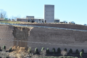 The section of the collapsed wall with the hotel construction above.